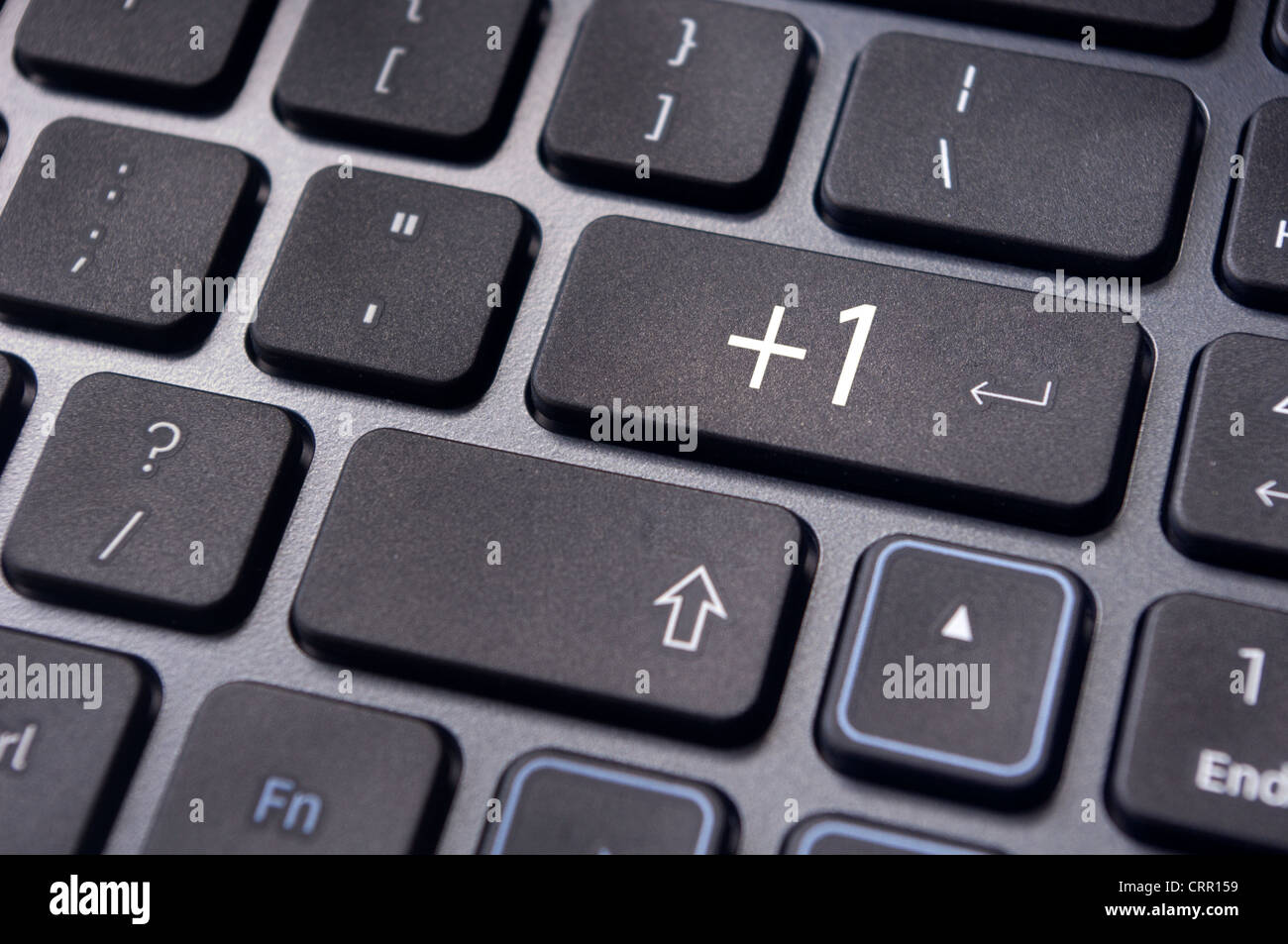 plus one concepts on enter key of keyboard, for internet social media. Stock Photo