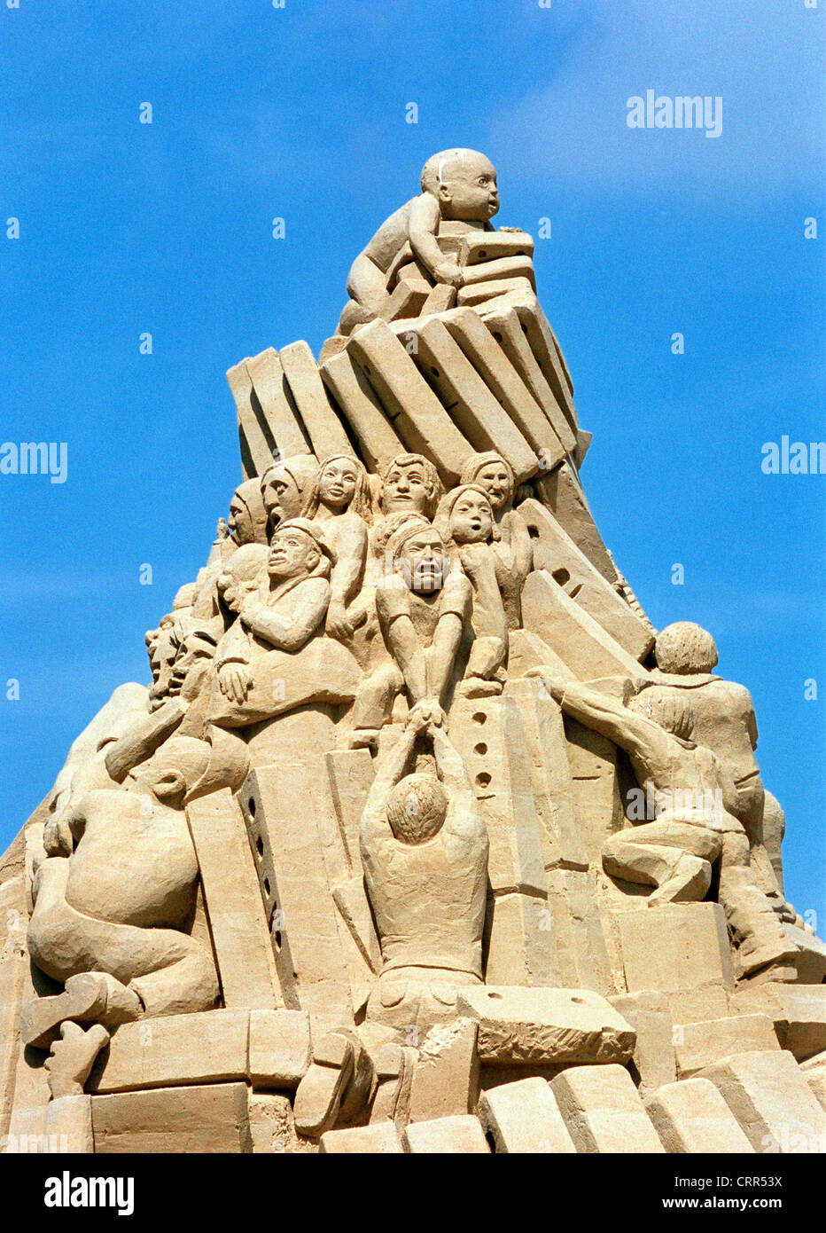 The sand sculpture faces a big city in Berlin Stock Photo