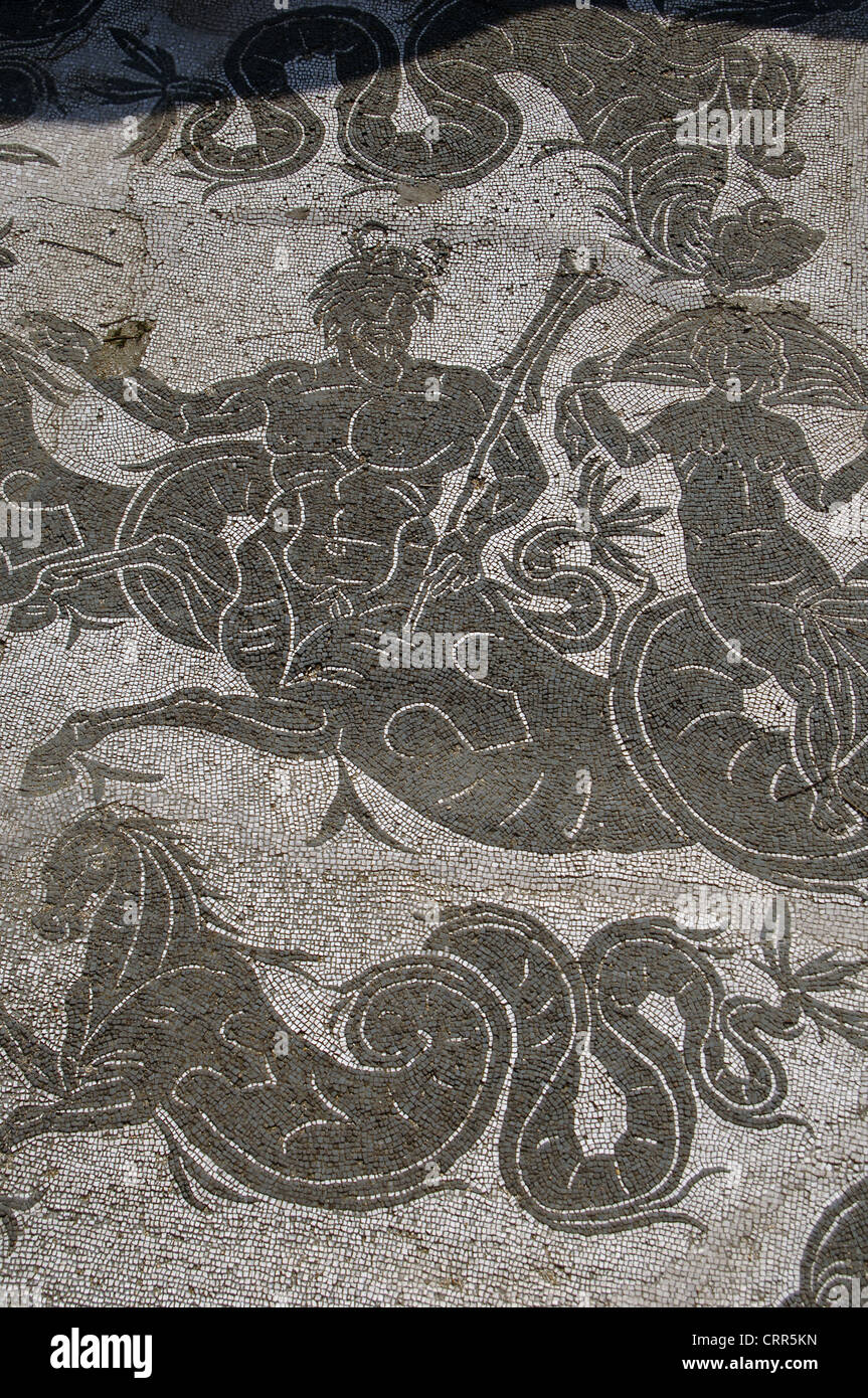 Ostia Antica. Baths of Buticosus. 1st - 2nd centuries AD. Caldarium. Mosaic depicting Triton and Nereid. Near Rome. Stock Photo