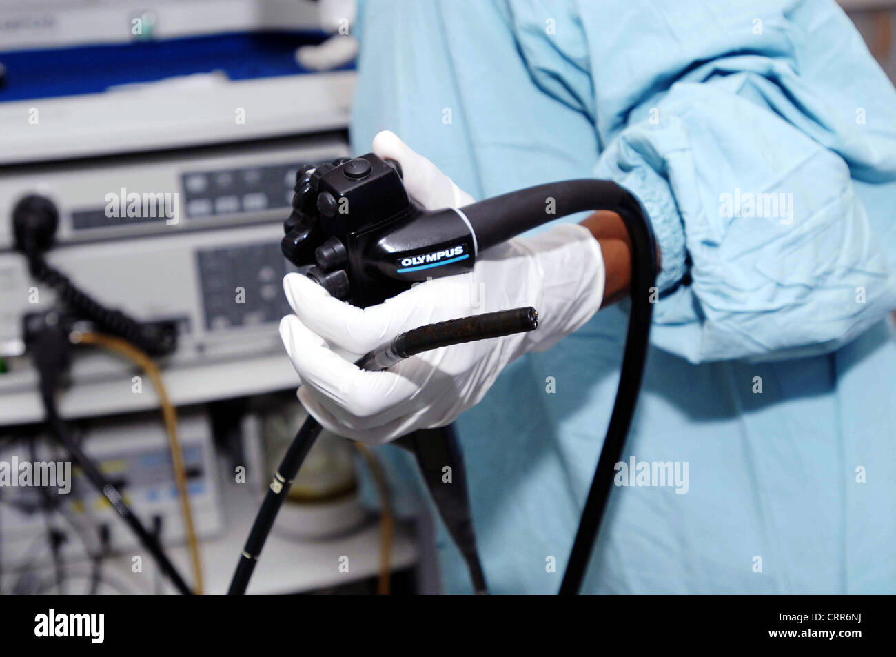 A doctor holding an endoscope in his hand Stock Photo - Alamy