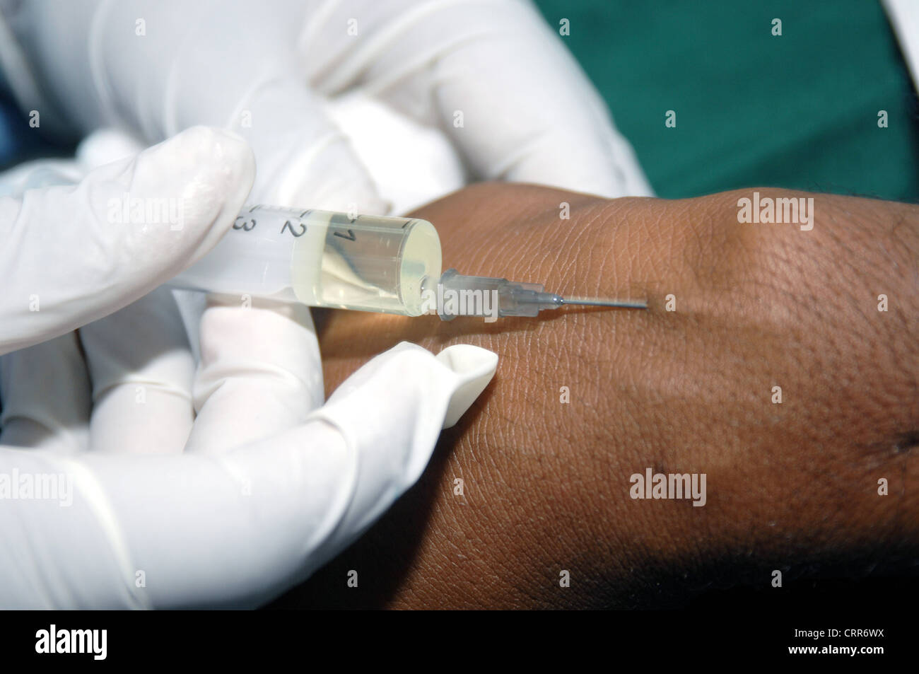 A patient receiving an injection. Stock Photo