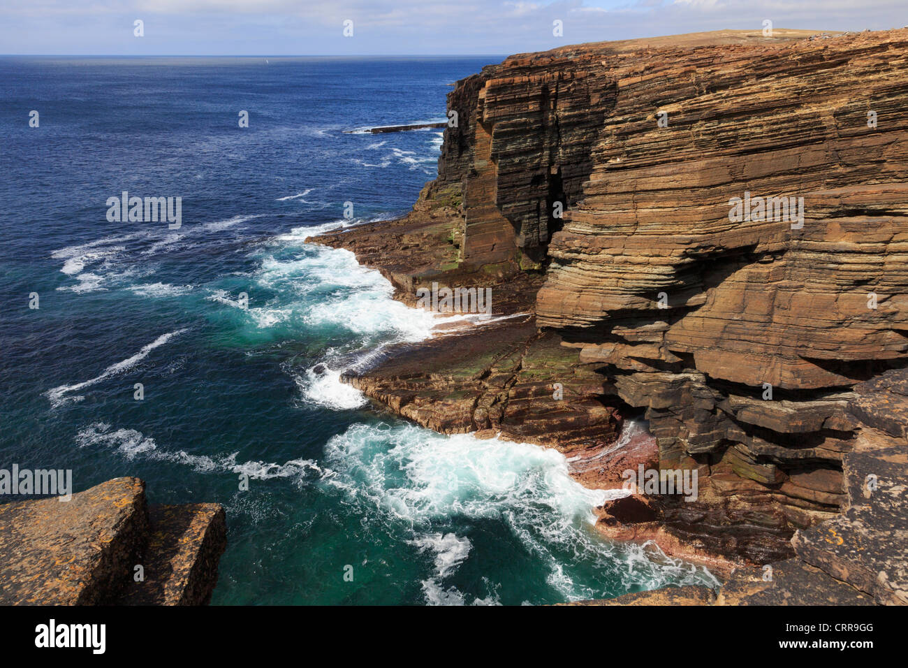 View along rugged coastline of old red sandstone cliffs on west mainland coast at Yesnaby Orkney Islands Scotland UK Stock Photo