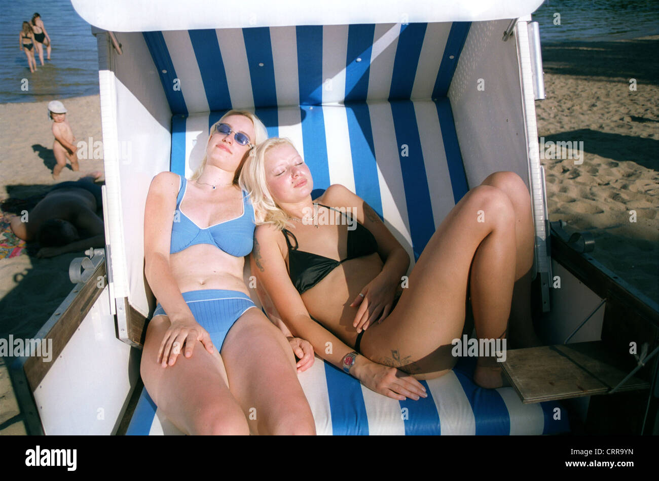 Women sun themselves in a bathing Berlin Stock Photo