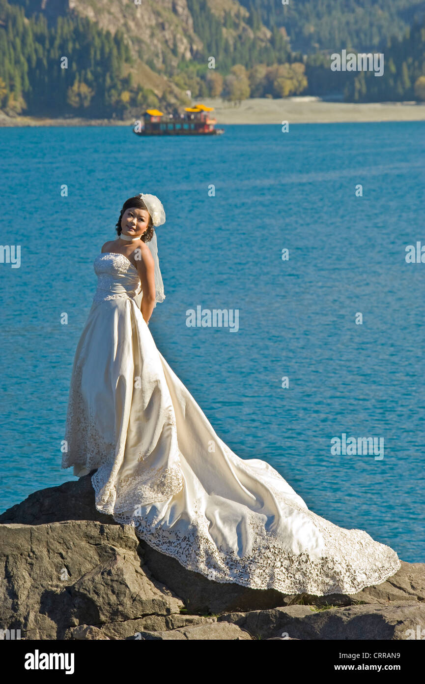 A Chinese Bride Poses For Her Wedding Photographs At The Popular
