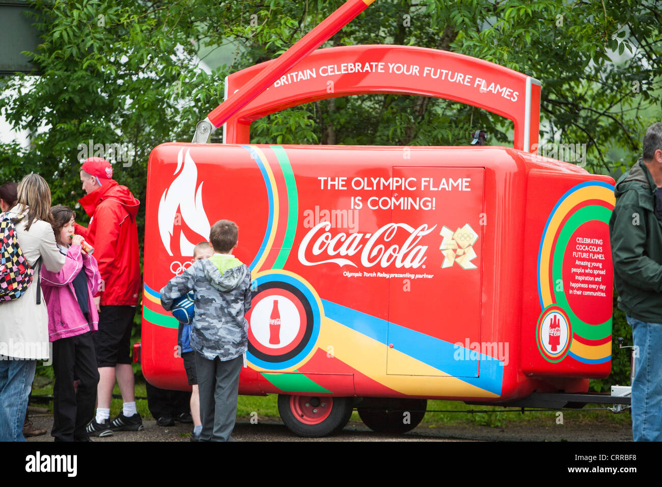 Coca Cola Sponsoring The Olympic Torch Relay In Ambleside Lake Coca cola sponsoring the olympic torch relay in ambleside lake