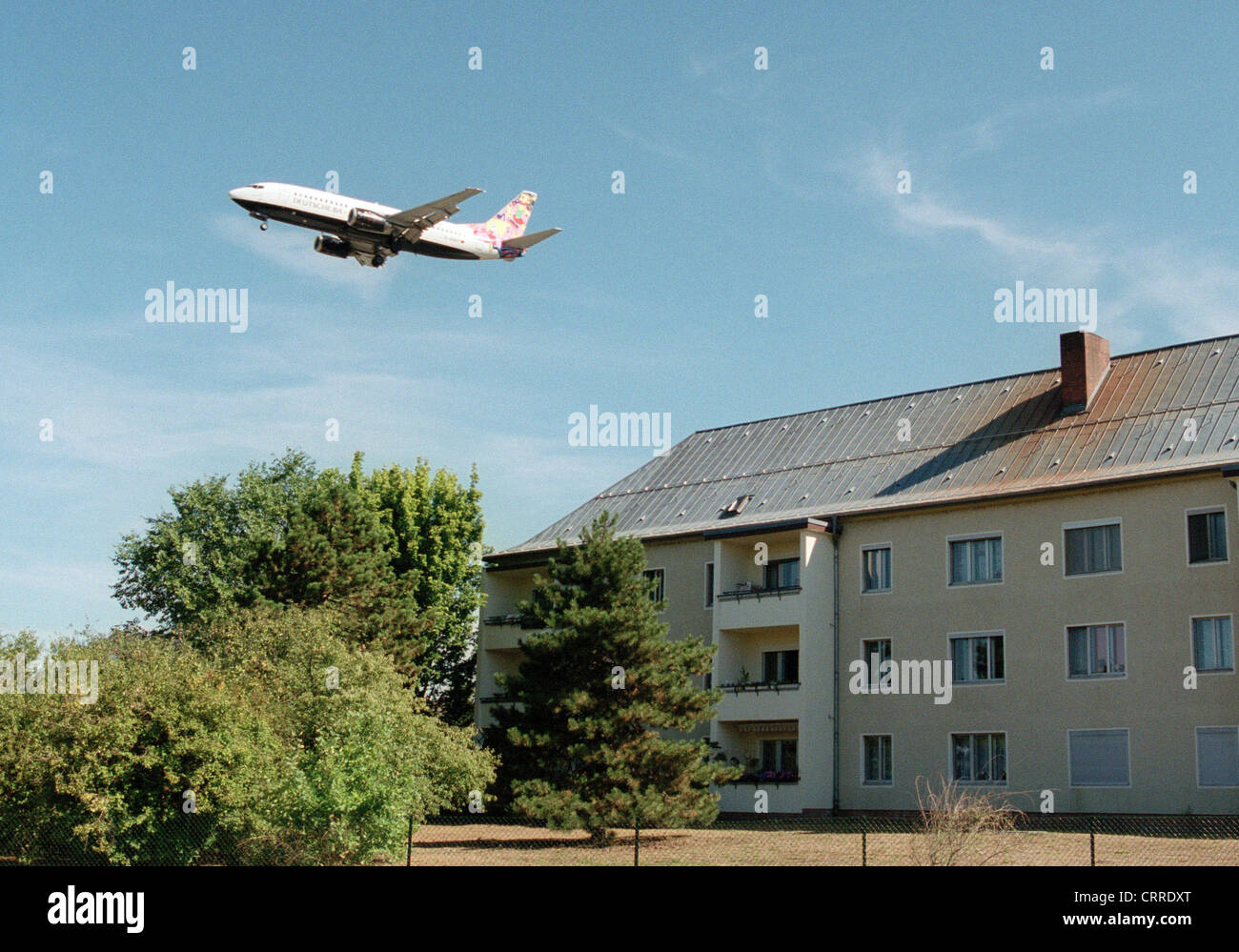 Airplane Landing Over Homes In Tegel Stock Photo Alamy Airplane Landing Over Homes In Tegel Stock Photo Alamy