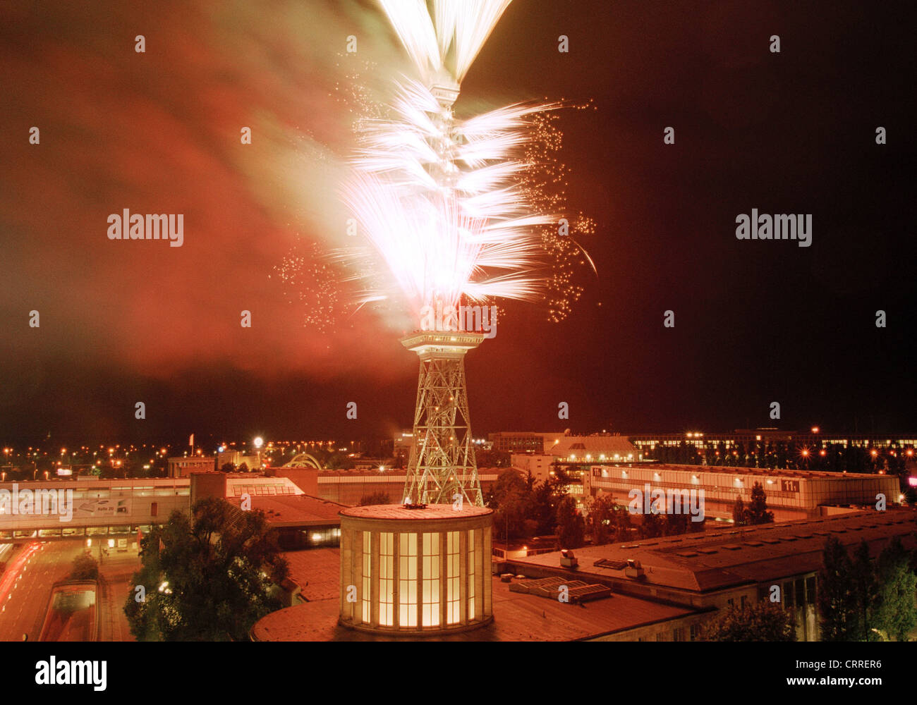 Night view of the radio tower in Berlin with fireworks Stock Photo