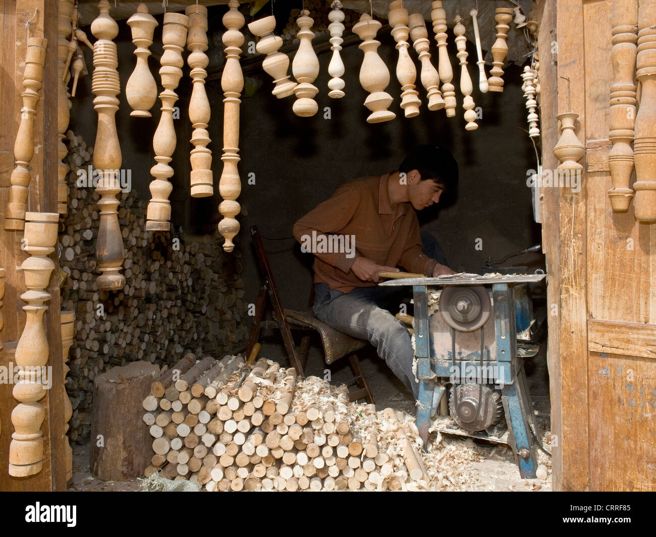 An Uyghur Chinese carpenter working from his shop in the Old City of