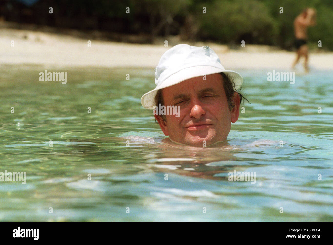A tourist swims in the Indian Ocean Stock Photo