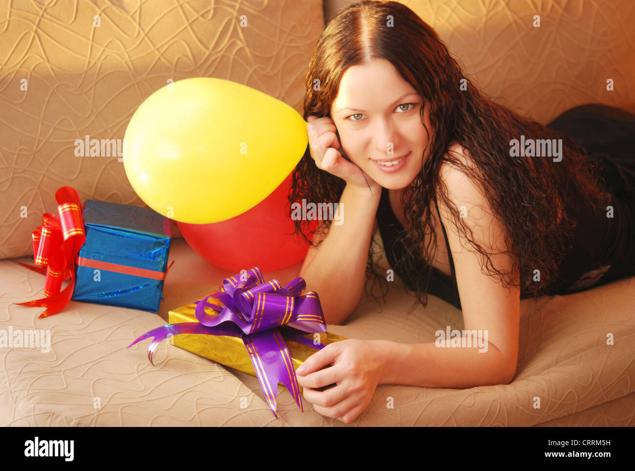 young happy woman with presents Stock Photo - Alamy