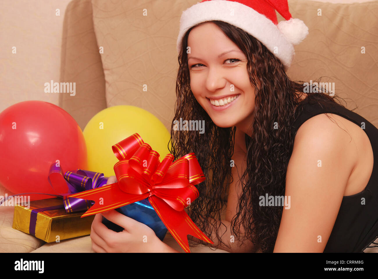 young happy woman with presents Stock Photo - Alamy