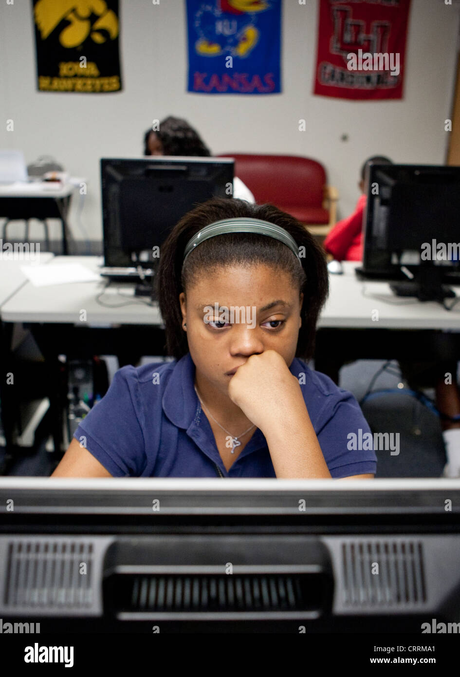 AfricanAmerican student in computer lab at a public charter high school in Houston, Texas Stock