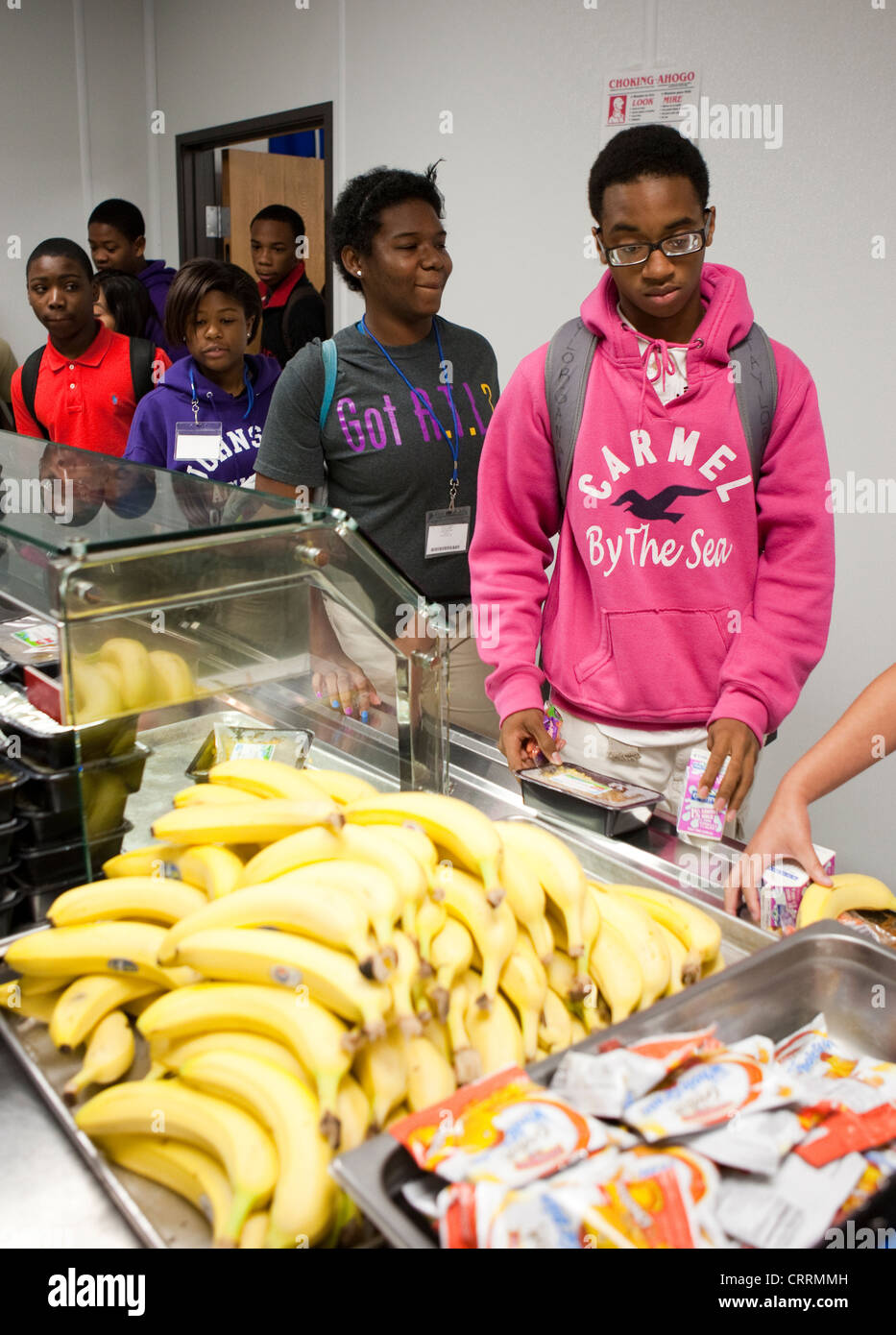 AfricanAmerican students in cafeteria line at public charter high
