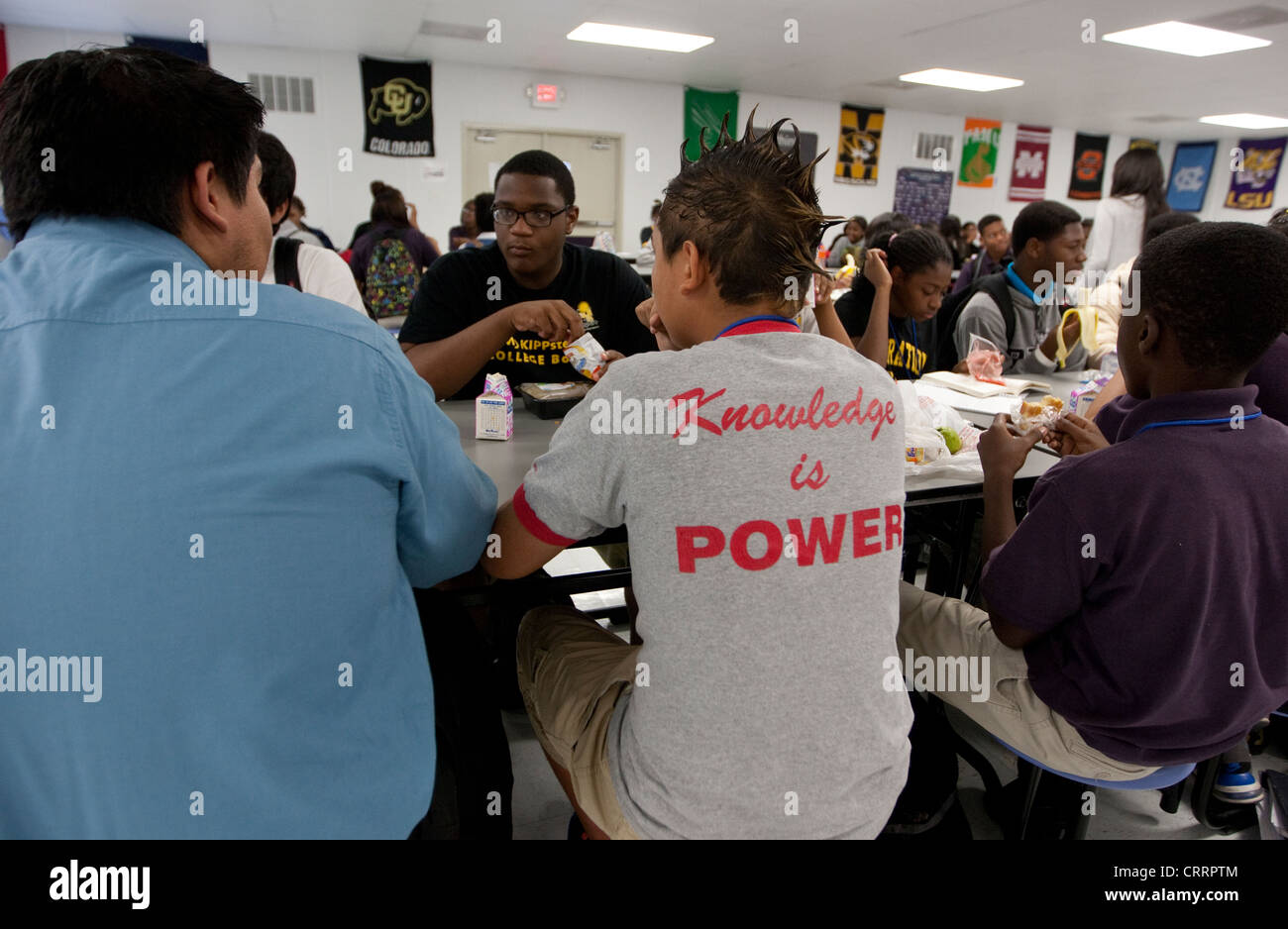 Students at public charter high school in Houston wear t-shirts with positive messages and wears spiky hair mohawk Stock Photo