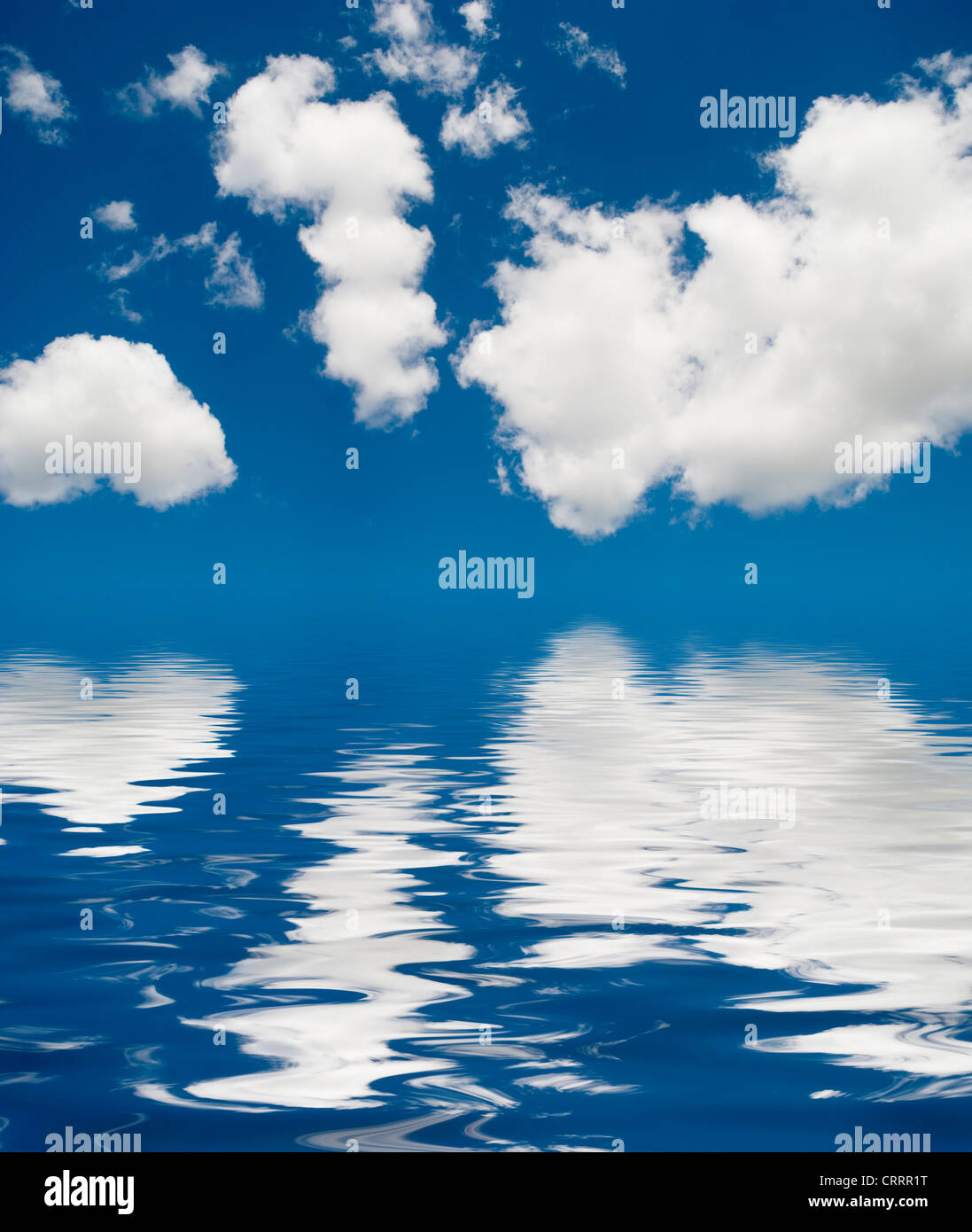 blue sky covered by clouds reflected in water Stock Photo - Alamy