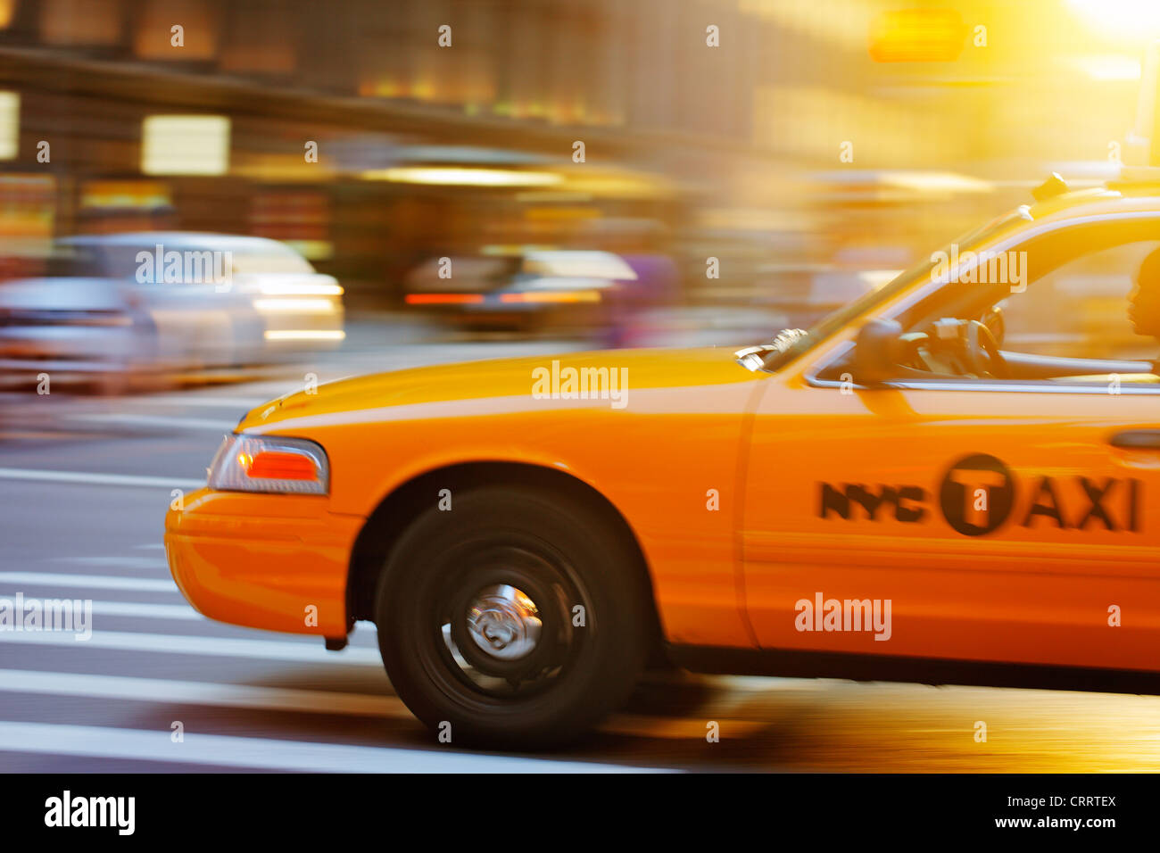 NEW YORK CITY, USA - JUNE 8: Blurry image of a NYC cab speeding in the city. June 8, 2012 in New York City, USA Stock Photo