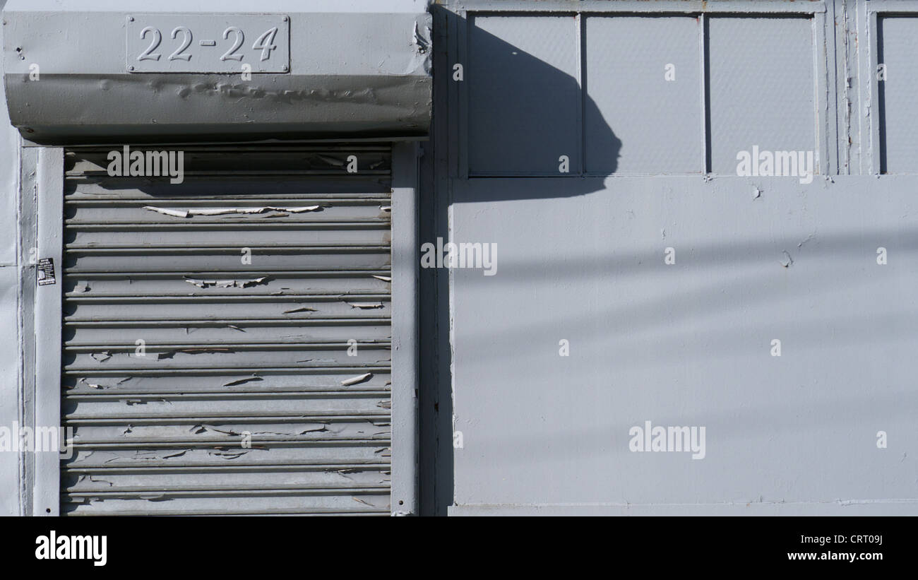 Roll-down gate, industrial warehouse, Red Hook, Brooklyn Stock Photo