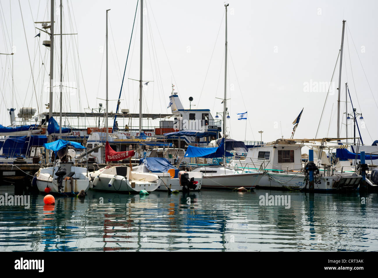 Boats line the docks a the Old Akko harbor, Israel Stock Photo - Alamy
