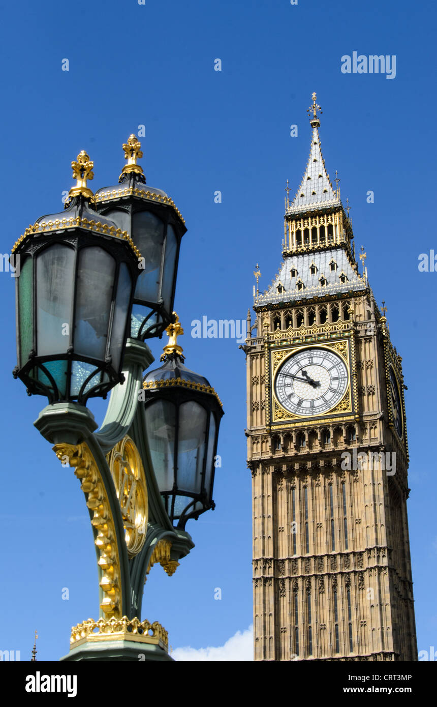 LONDON, UK - Elizabeth Tower and Ornate Street Lights 169-095045607 169-095045607 The clock of Elizabeth Tower (commonly known as Big Ben) on the Palace of Westminster, with some of the ornate streets lights of Westminster Bridge in the foreground. Stock Photo