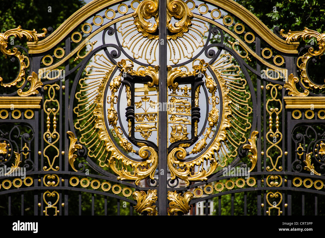 LONDON, United Kingdom — The Green Park gates, a set of ornate wrought-iron gates, mark the entrance to Buckingham Palace from Green Park. These gates, adorned with intricate designs, are not only a security feature but also a symbol of the grandeur of the British Royal Family's primary residence. Stock Photo