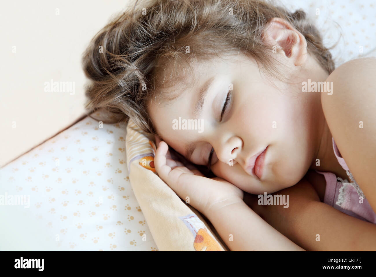 Little Child Girl Sleeping in Her Bed Stock Photo - Alamy