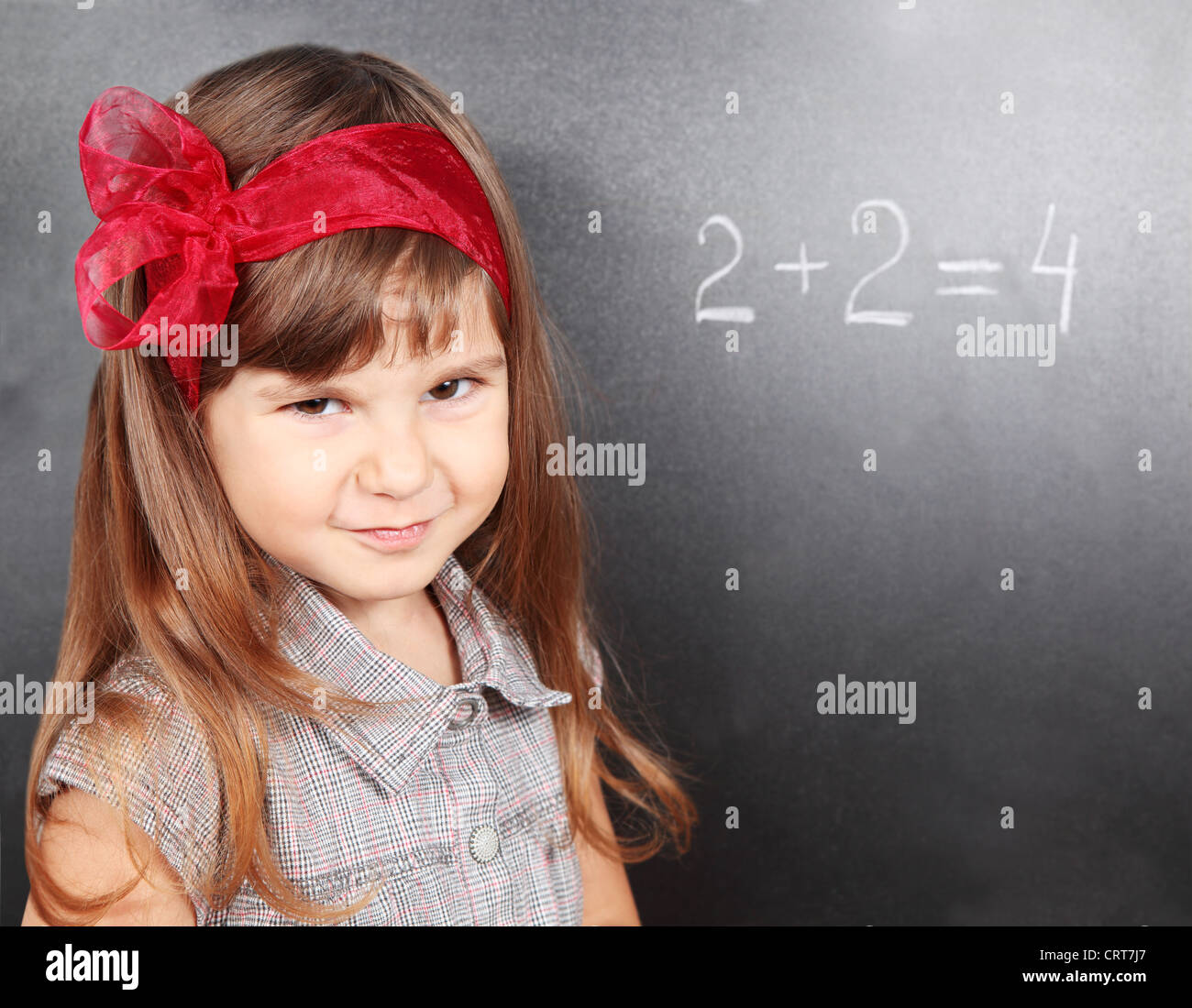 Smiling Girl Near School Blackboard Learning Mathematics Stock Photo