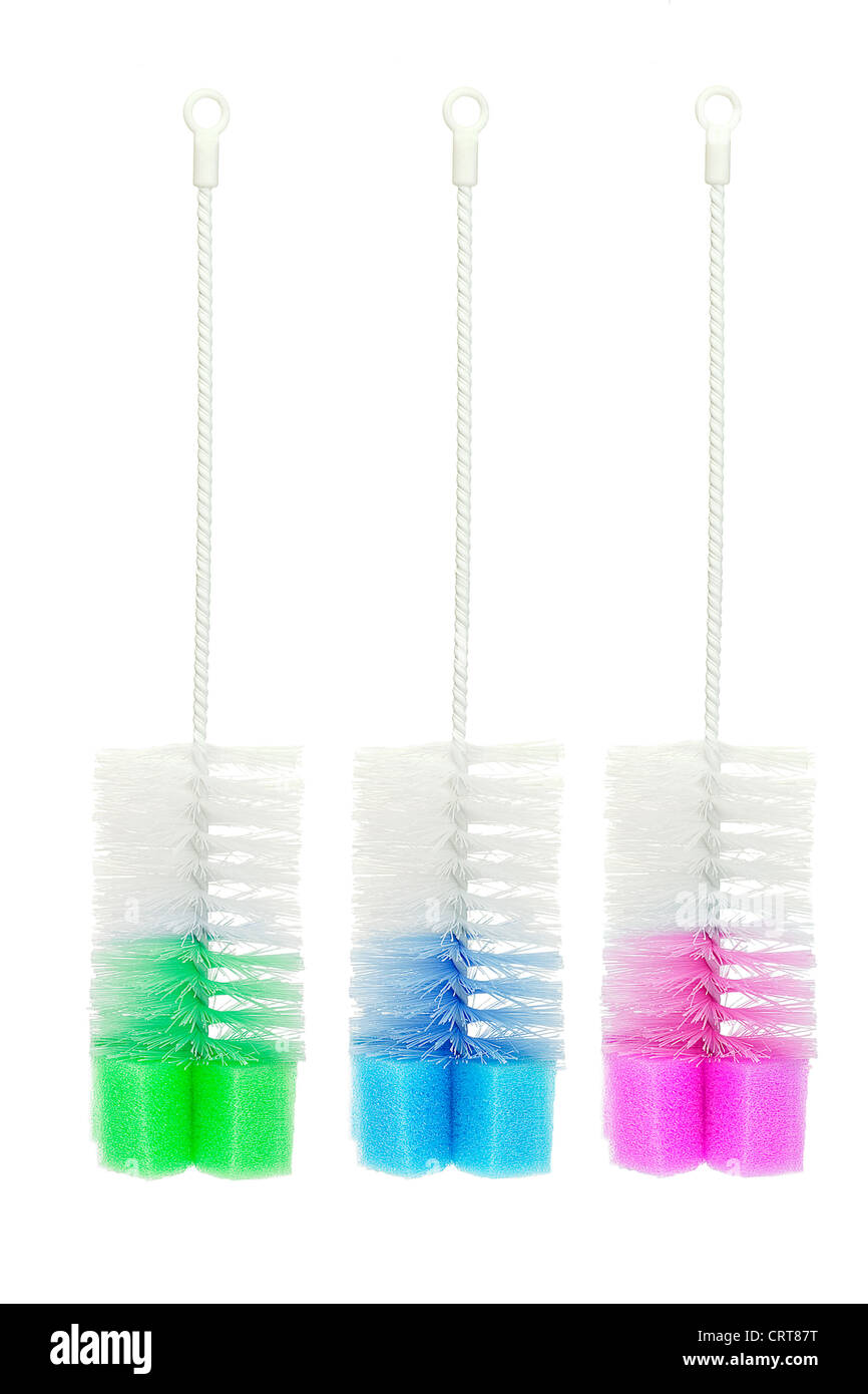 Three Colorful Bottle Brushes on White Background Stock Photo