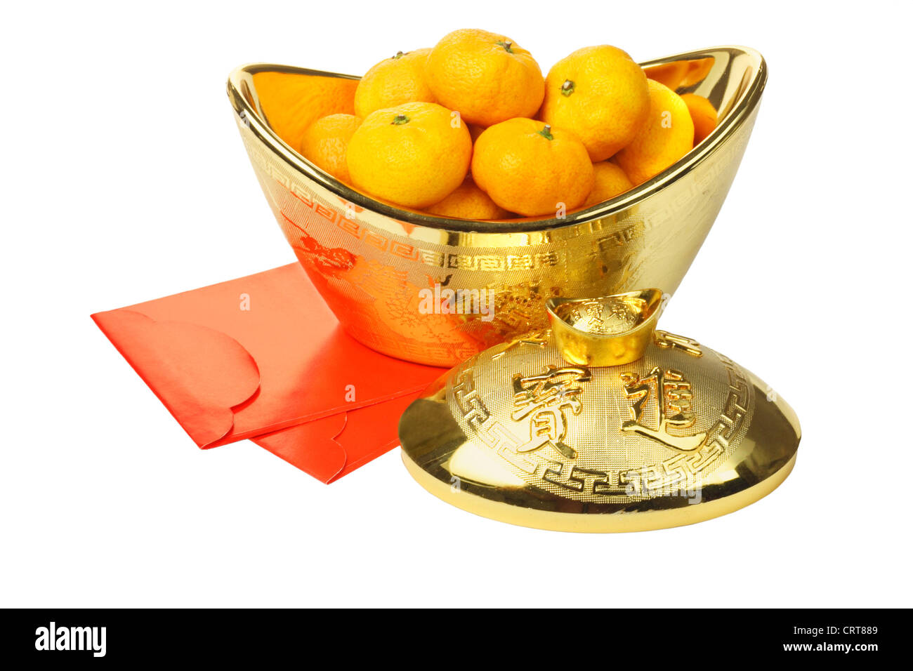 Chinese New Year Mandarin Oranges in Gold Ingot Container and Red Packets on White Background Stock Photo