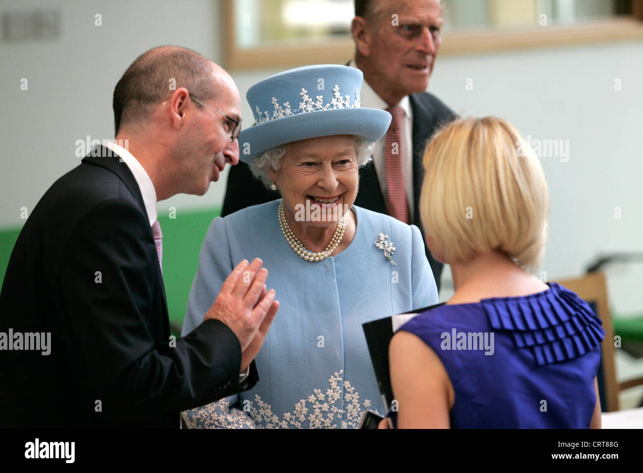 Her Majesty The Queen being introduce to a member of Staff by Gerard