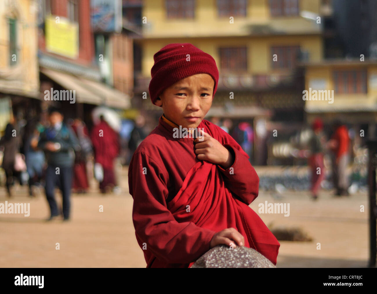 Young Tibetan Monk, Boudhanath, Kathmandu, Nepal Stock Photo