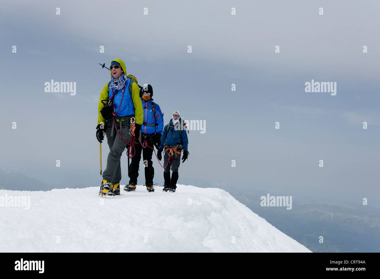 Climbers arriving at the top of Mont Blanc Stock Photo