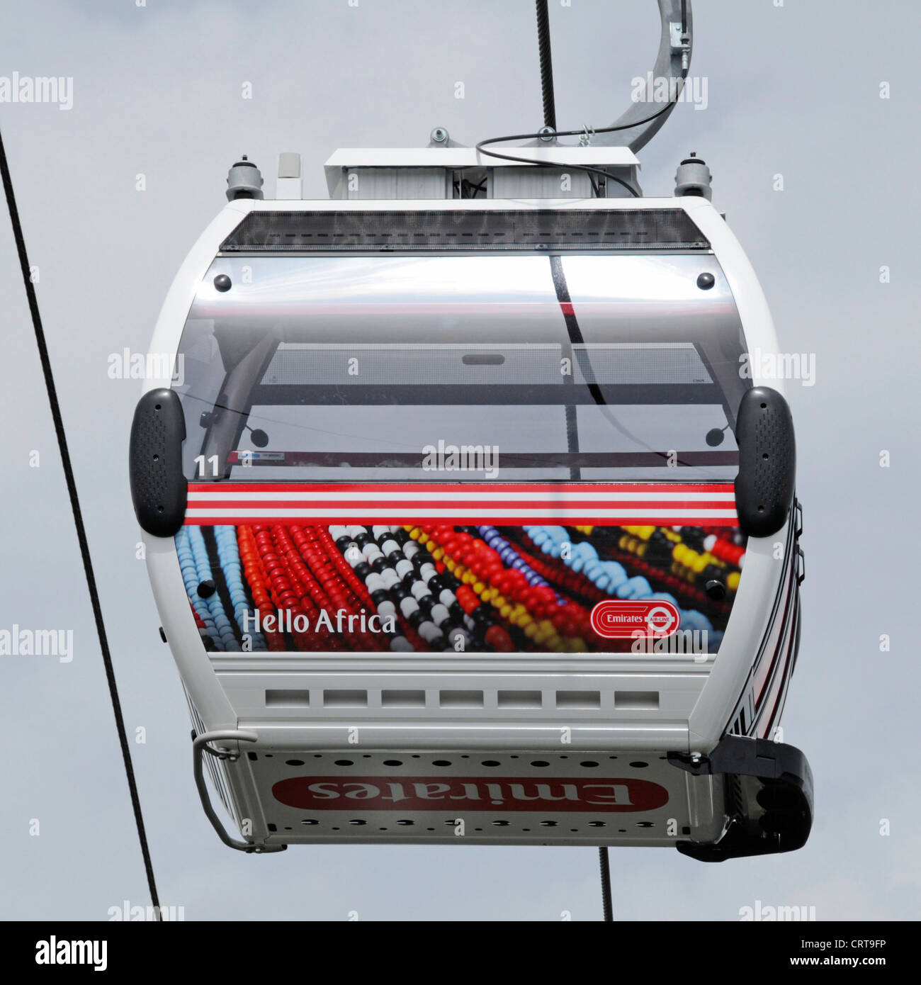 Emirates Air Line advertising on sponsored cable car crossing River ...