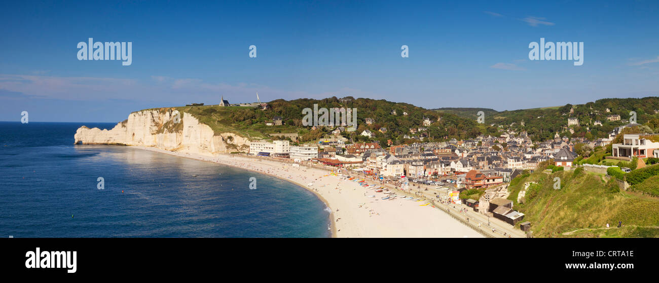 The seaside town of Etretat, Normandy, France, with its beach and chalk cliffs. Stock Photo