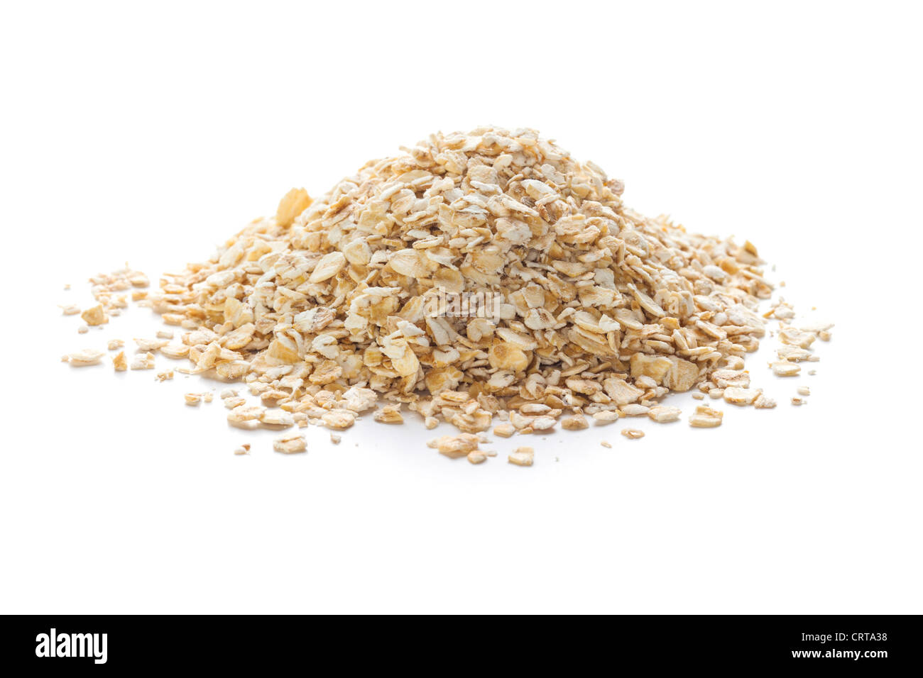 A pile of rolled oats on a white background with soft natural shadow. Stock Photo