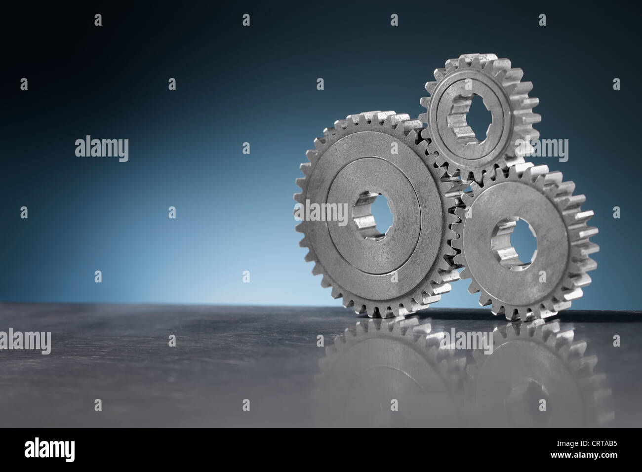 Still life with Old metallic cog gear wheels. Stock Photo