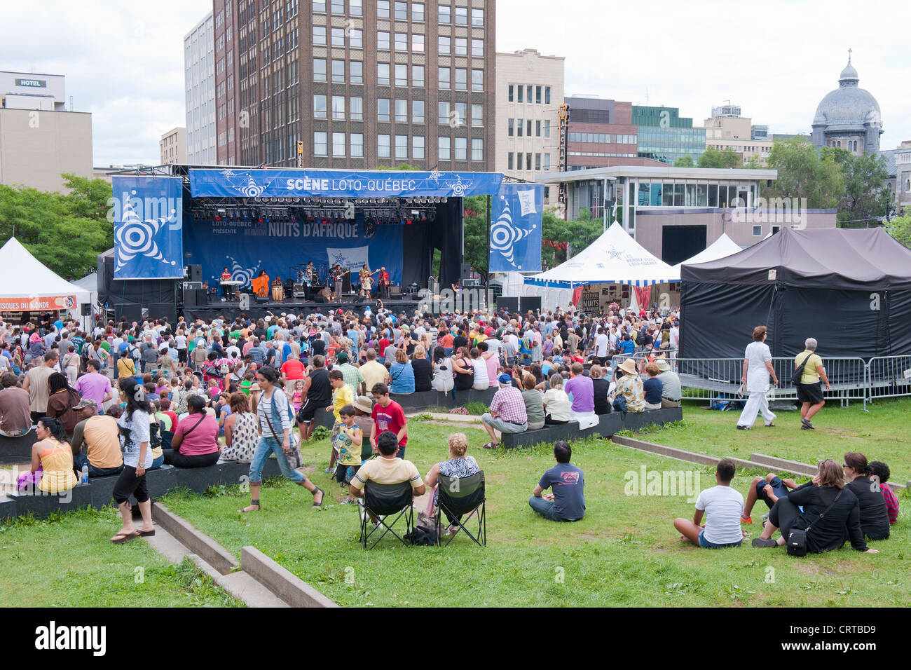 Crowd attending an outdoor concert given during the Nuits d'Afrique Festival in Montreal, province of Quebec, Canada. Stock Photo