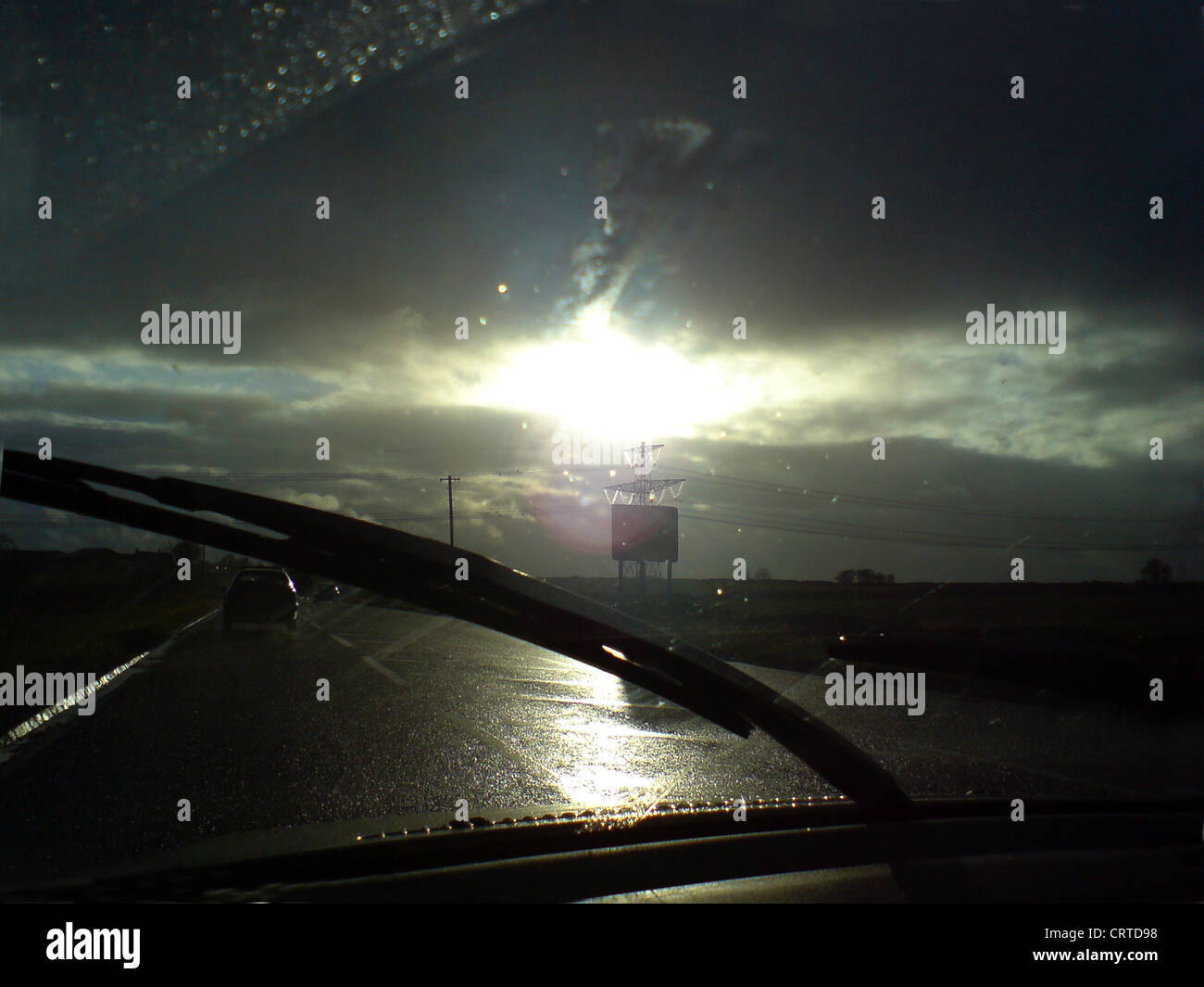 Driving in stormy weather, view through windscreen Stock Photo