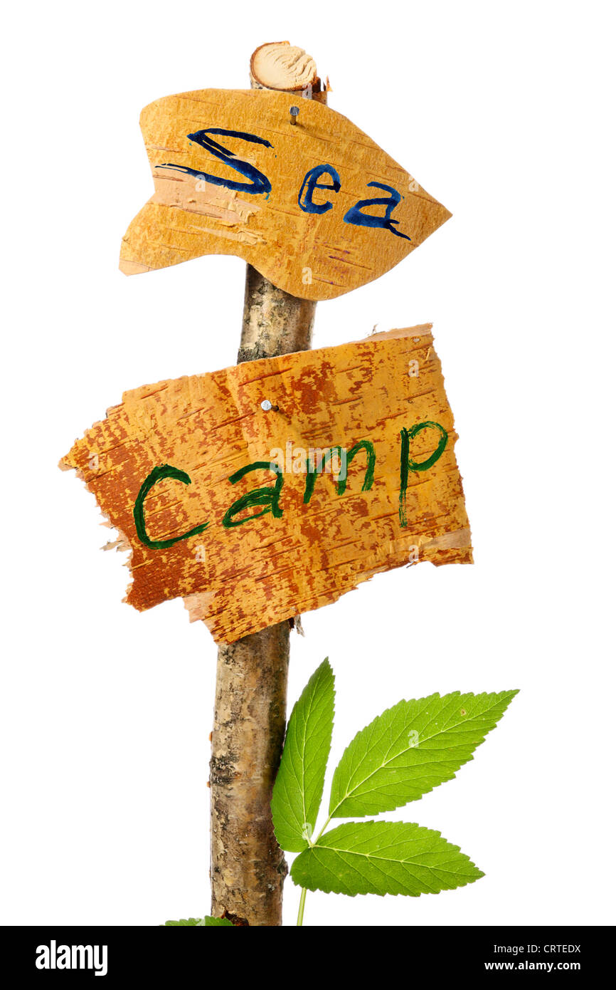The wooden signs determining a place of camp and a direction to sea Stock Photo