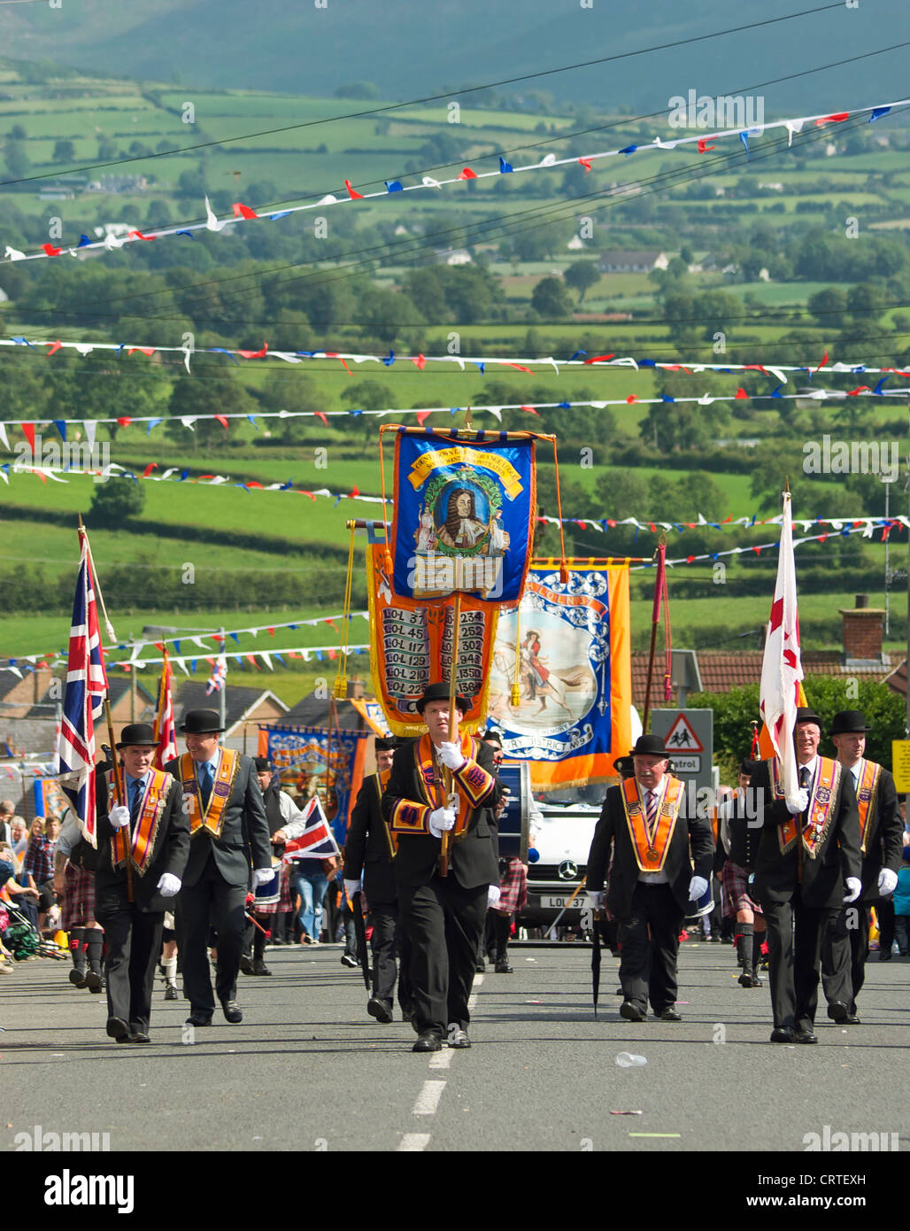 12th July, 2011. Rathfriland, Northern Ireland, UK. Orangemen march up the hill to Rathfriland, Northern Ireland. Stock Photo