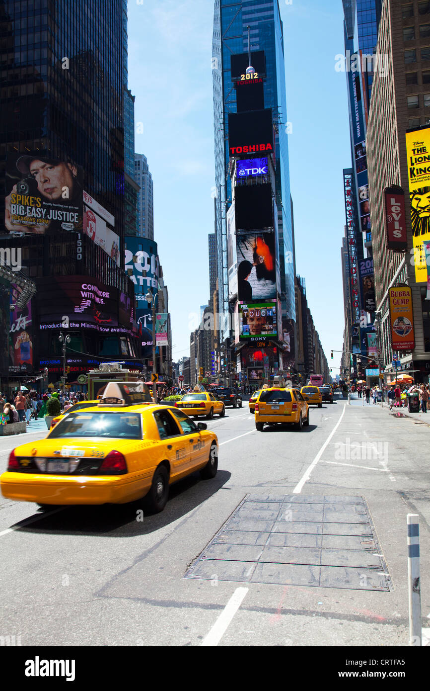 The iconic yellow taxi cab in Times Square, New York city USA. Times