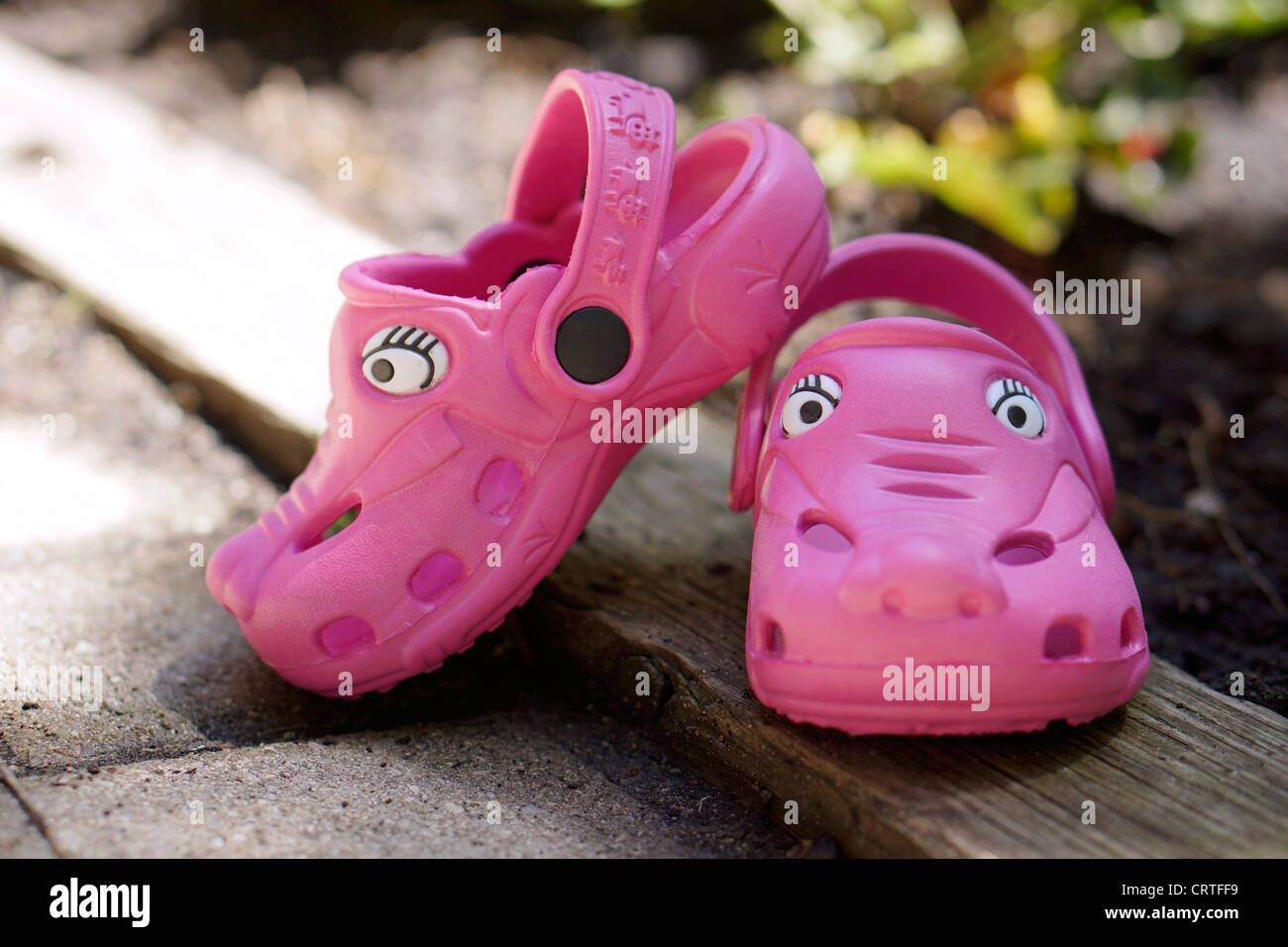 Pink Plastic Clogs Stock Photo