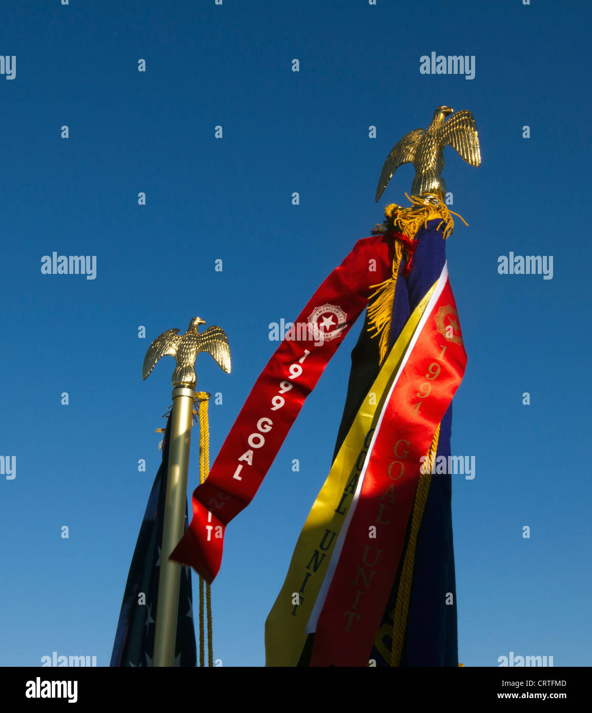 Flag poles, flags and ribbons. Stock Photo