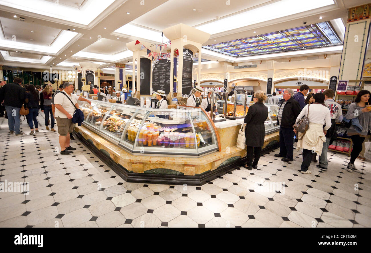 Food counter in the food hall at Harrods, London, England UK Stock