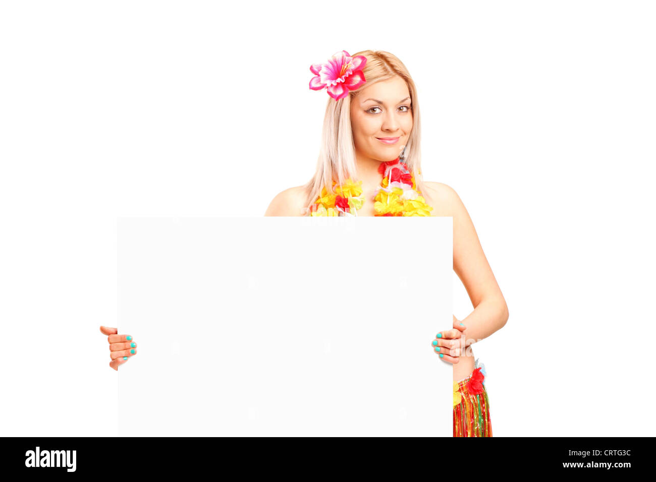 An attractive young woman dressed in a hawaiian costume holding a panel isolated on white background Stock Photo