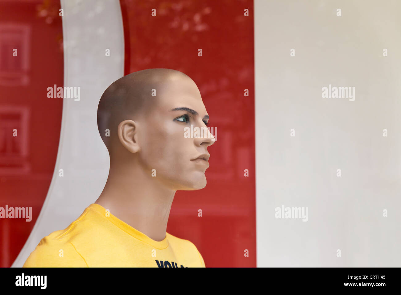 Portrait of a male dummy in window display. Stock Photo