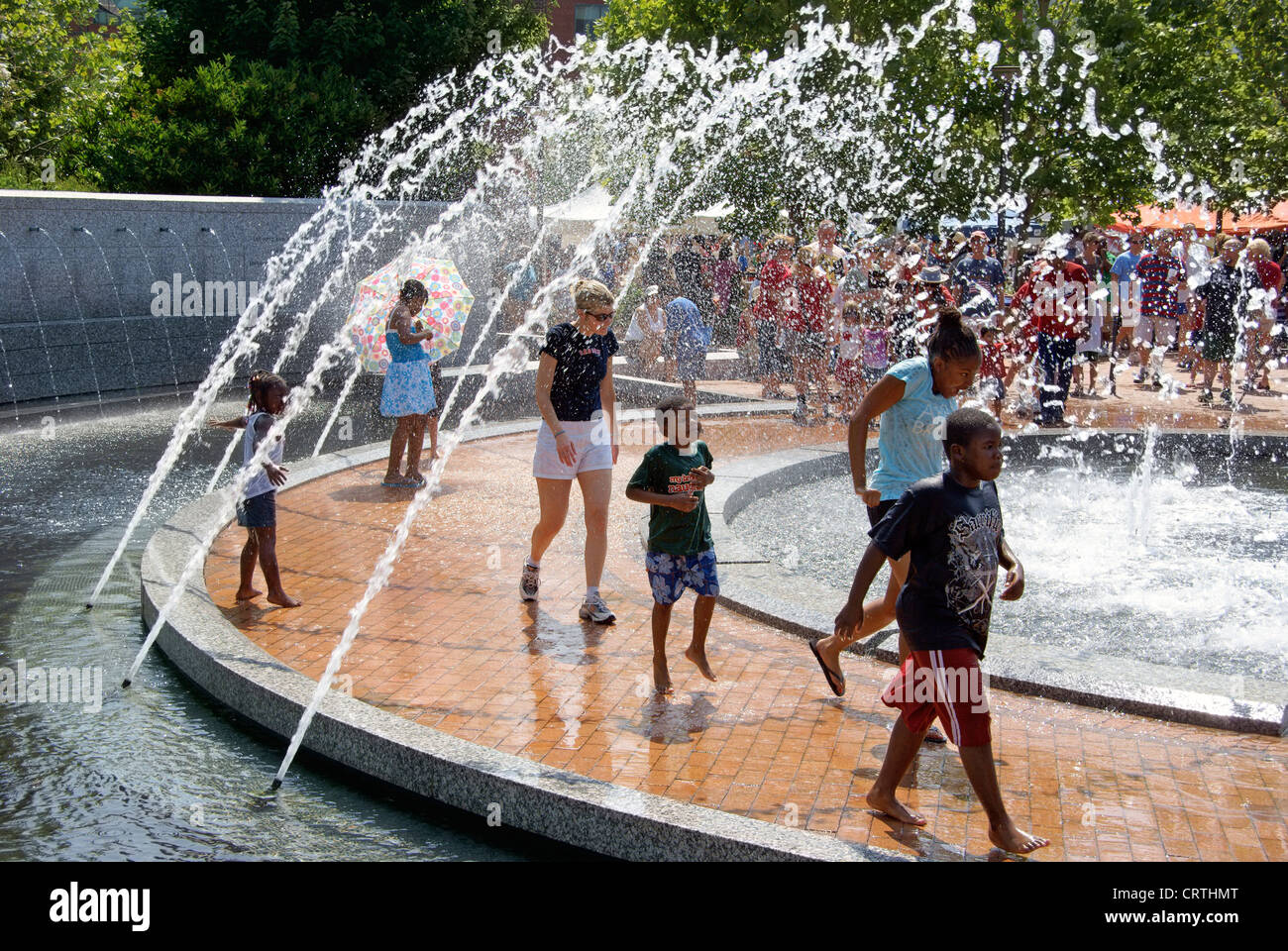 Greensboro, NC. Adults and children are finding relief from the hot