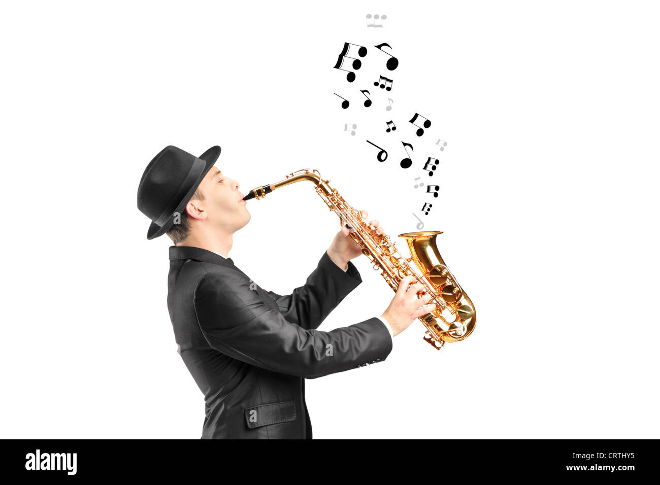 A male playing on saxophone and notes coming out isolated against background Stock Photo