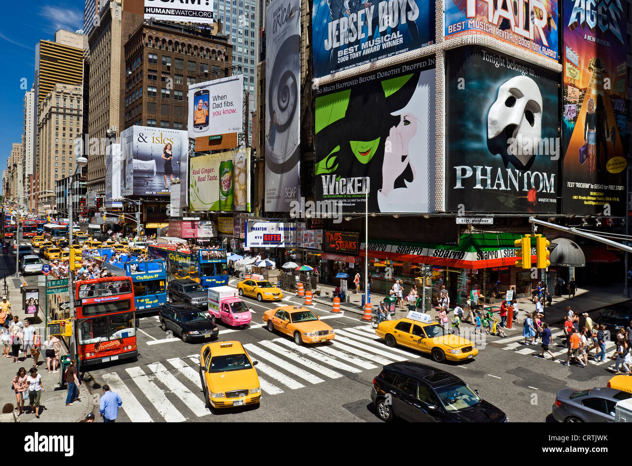 Traffic and taxis on Seventh Avenue, Times Square, New York City. Stock Photo