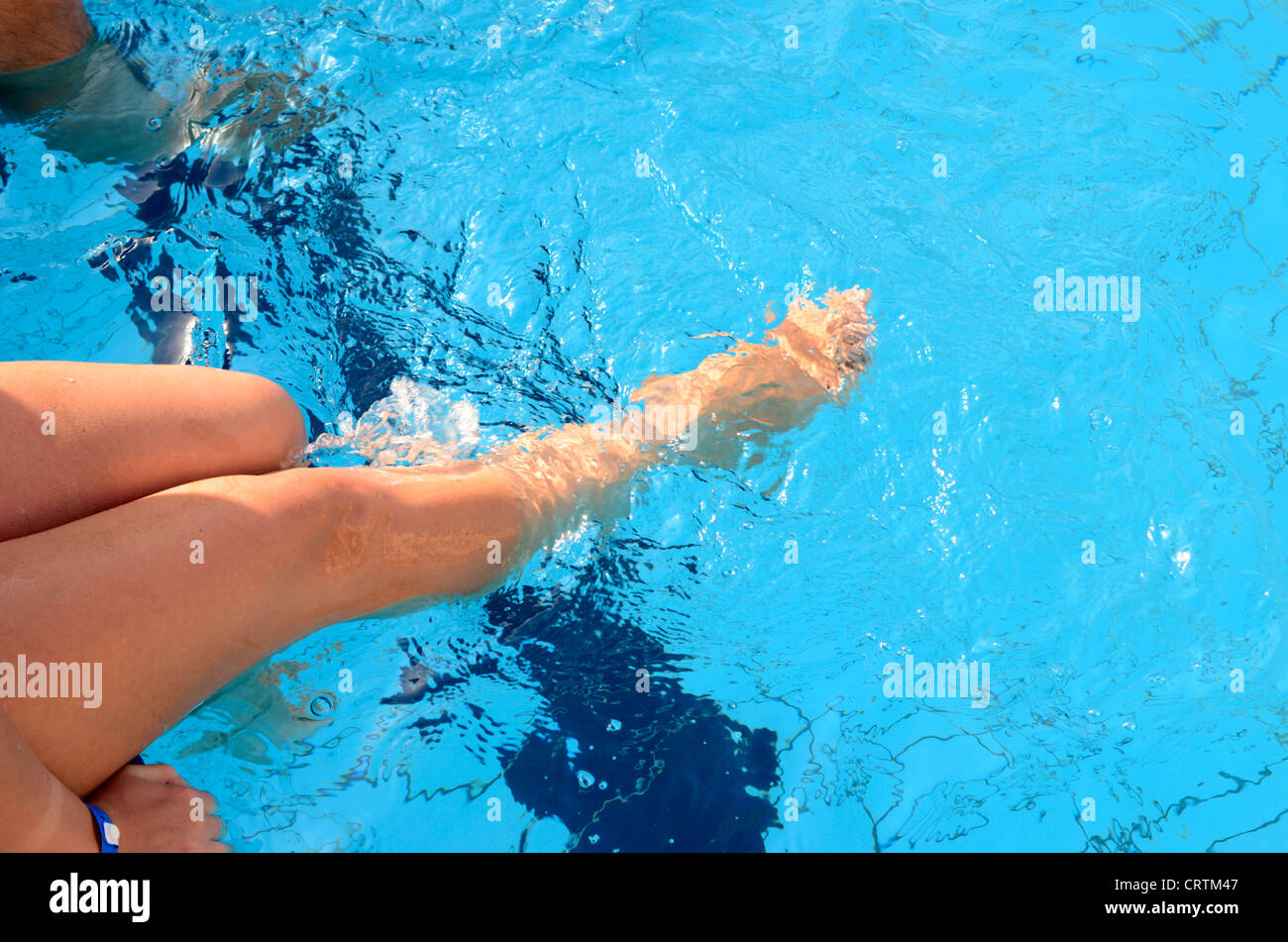 woman legs in the pool Stock Photo Alamy