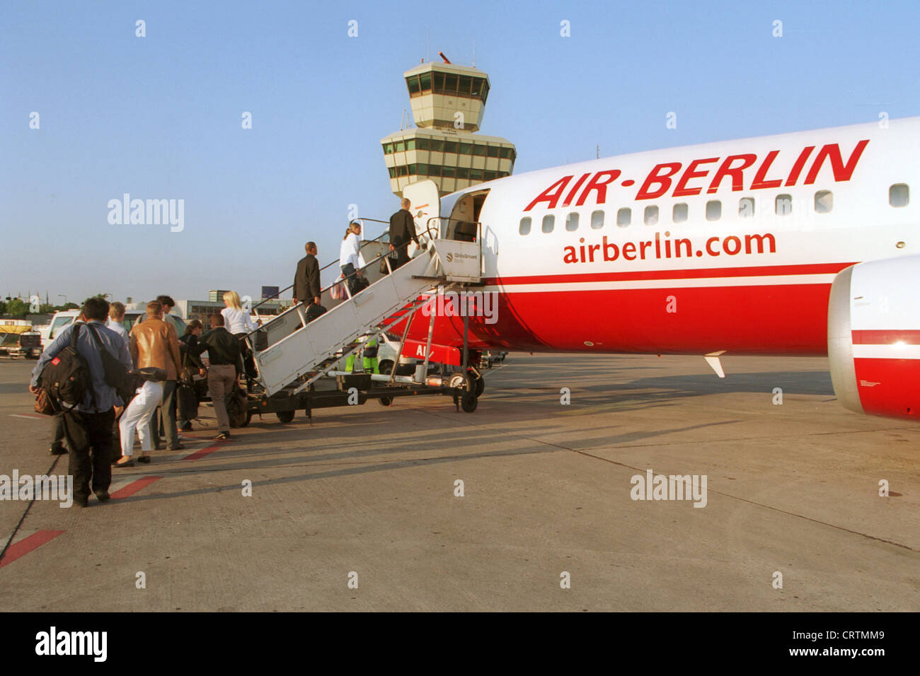 Passengers when boarding an engine of Air Berlin in Berlin-Tegel Stock Photo